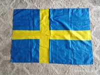 Flaga Szwecji żółty krzyż na niebieskim tle
