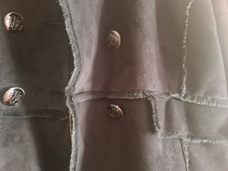 Casaco preto de pêlo por dentro