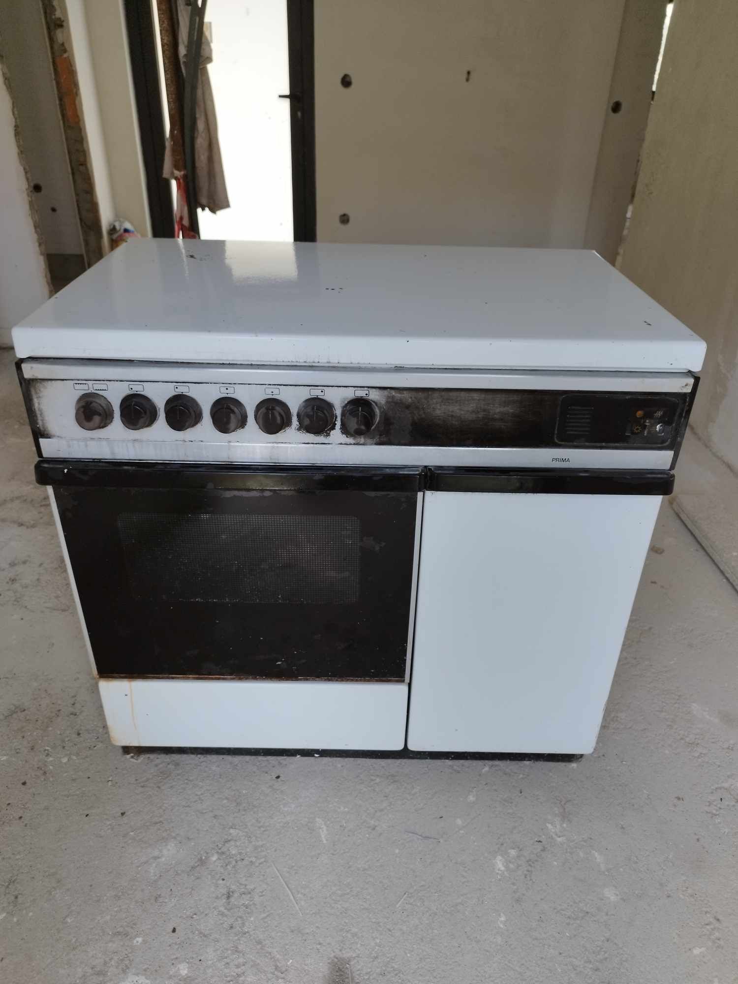 Fogão grande de 6 bocas, a gás e elétrico, com forno, porta e gaveta