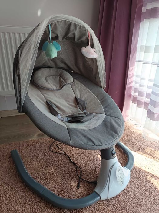 Дитяча електрична гойдалка