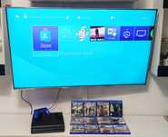PlayStation 4 pro  1 TB UHD 4K Pad V2 + 12 gier akcesoria