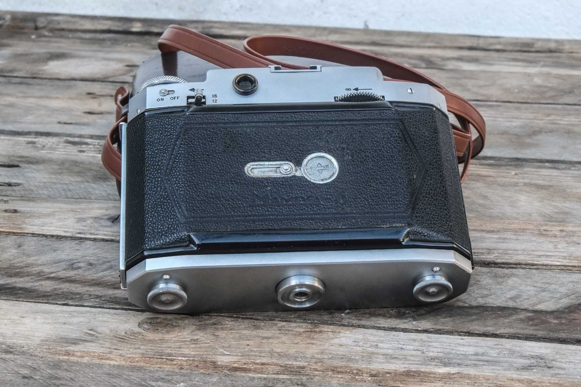 Mamiya 6 c/obj. Zuiko 75mm f:3.5 com telémetro dos anos 50.