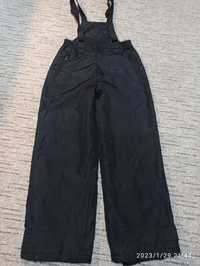 Czarne spodnie zimowo wiosenne dla chłopca i dziewczynki 134/140 bdb
