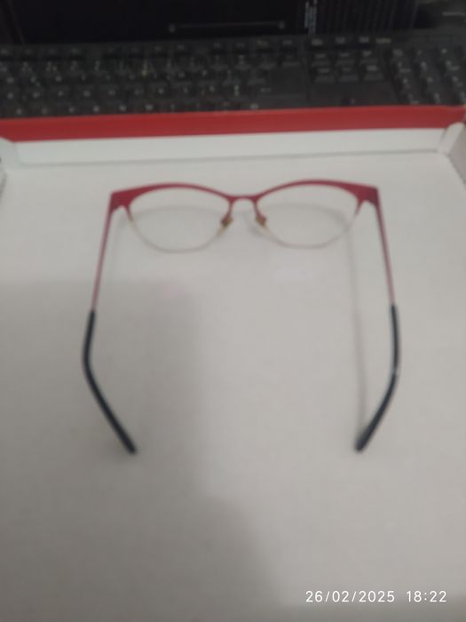 Óculos metálicos marca inglesa mulher