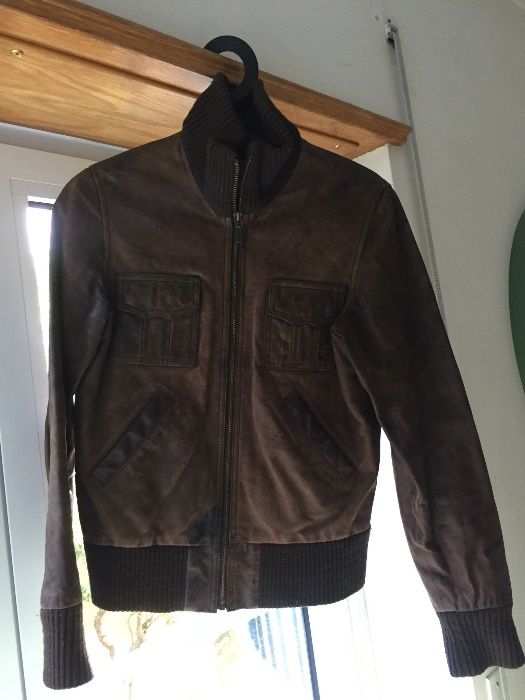 Blusão de pele (de senhora)