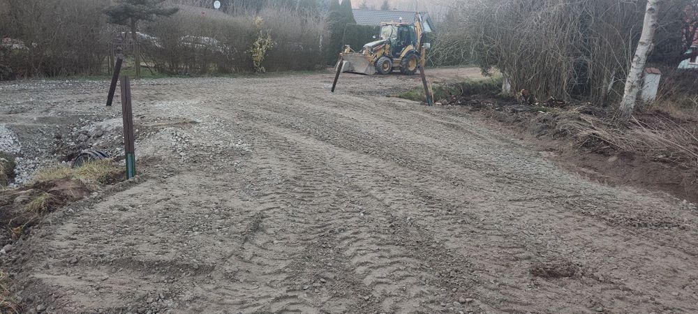 Roboty Ziemne Usługi koparko  ładowarką CAT Pracę Ziemne Odśnieżanie