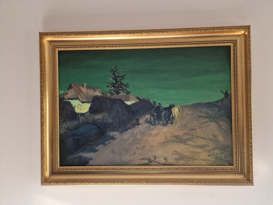 Obraz w złotej ramie