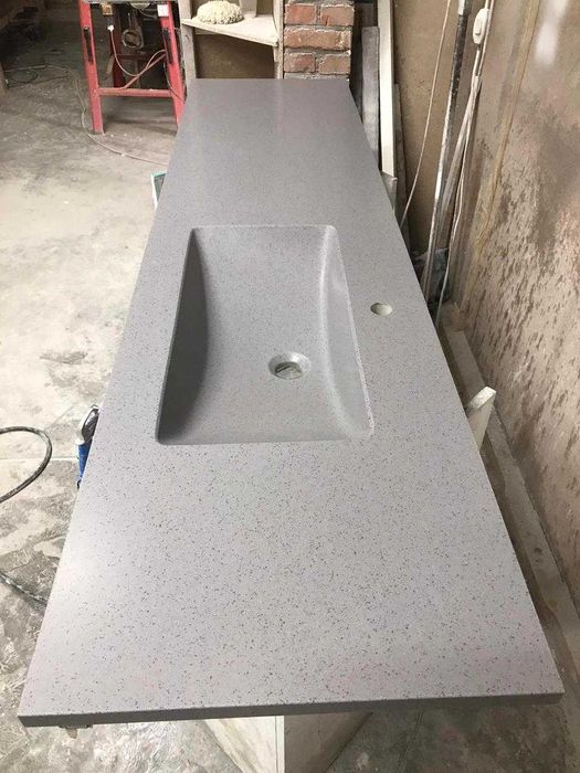 Умивальники цільновилиті з стільницею