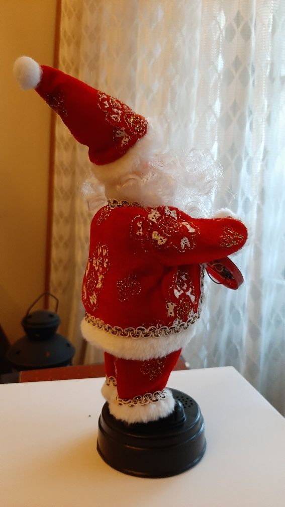 Pai Natal com música, A pilhas.  28 cm