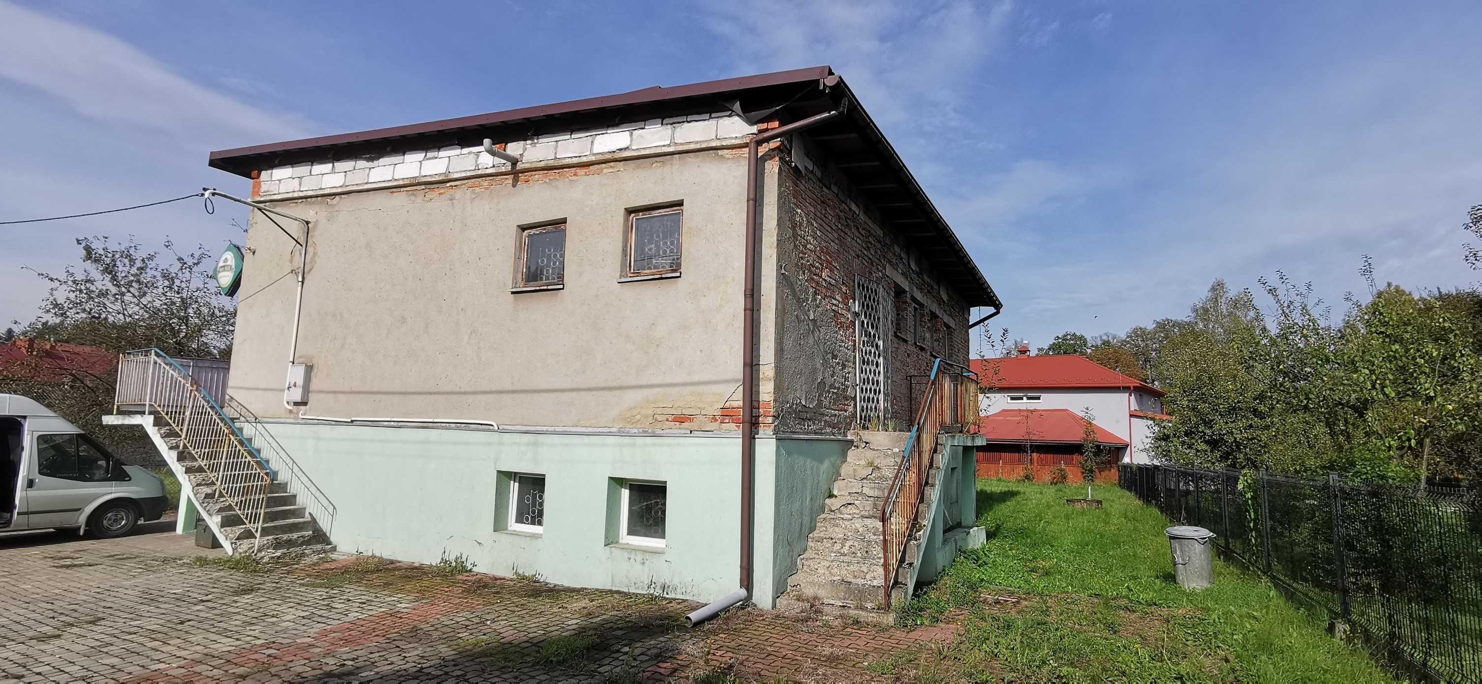 Budynek z działką 7,7 ar