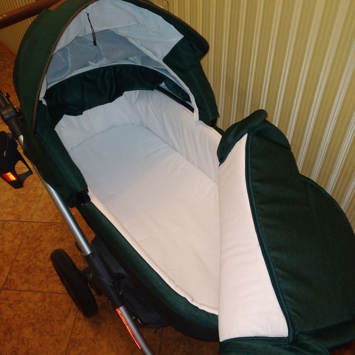 Каляска2в1..Має маскітну сітку.дощовик