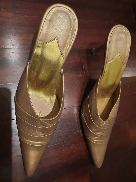 Mules Haity e clutch.