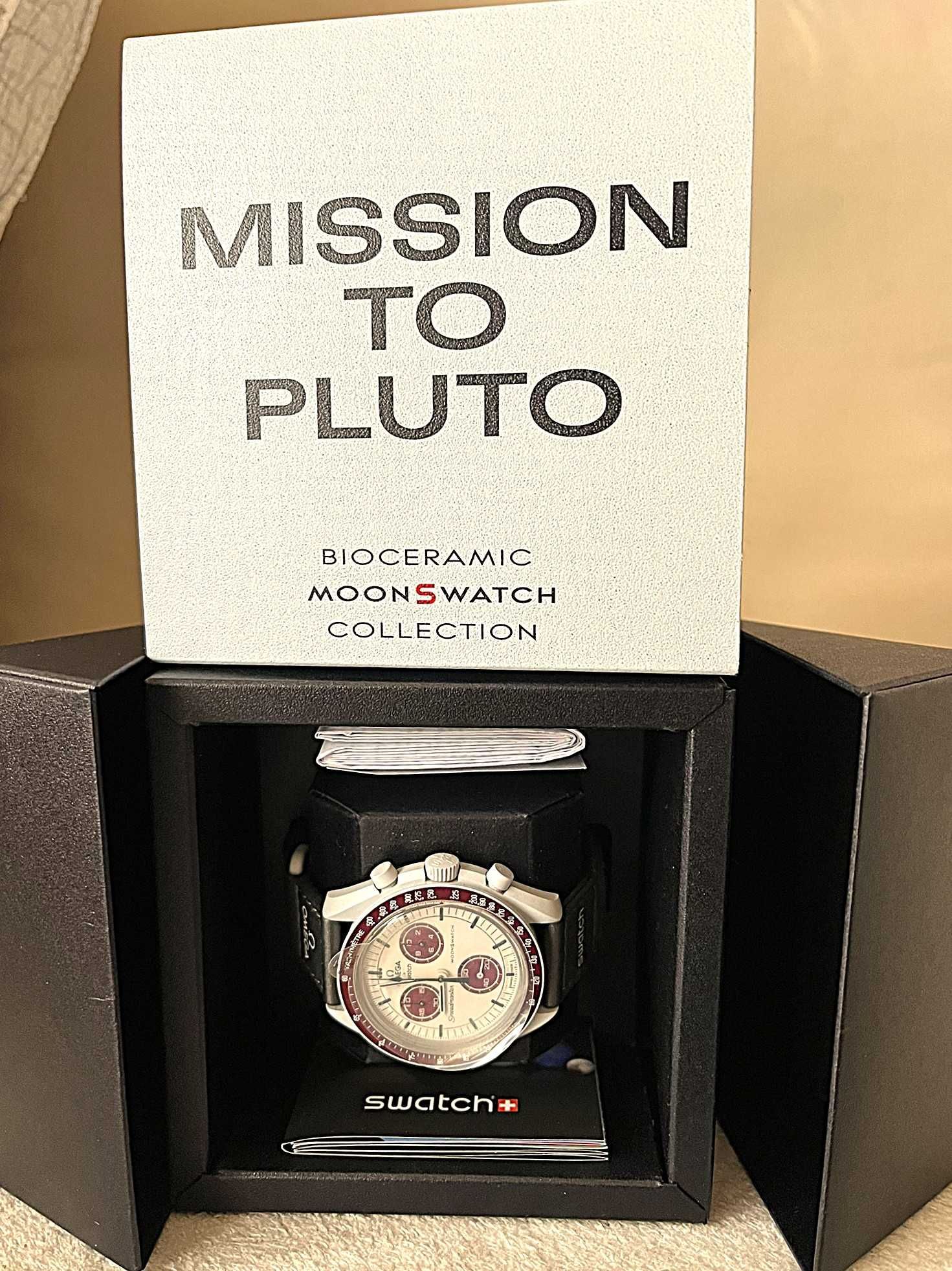 Swatch x Omega Bioceramic Moonswatch Mission to Pluto + książka
