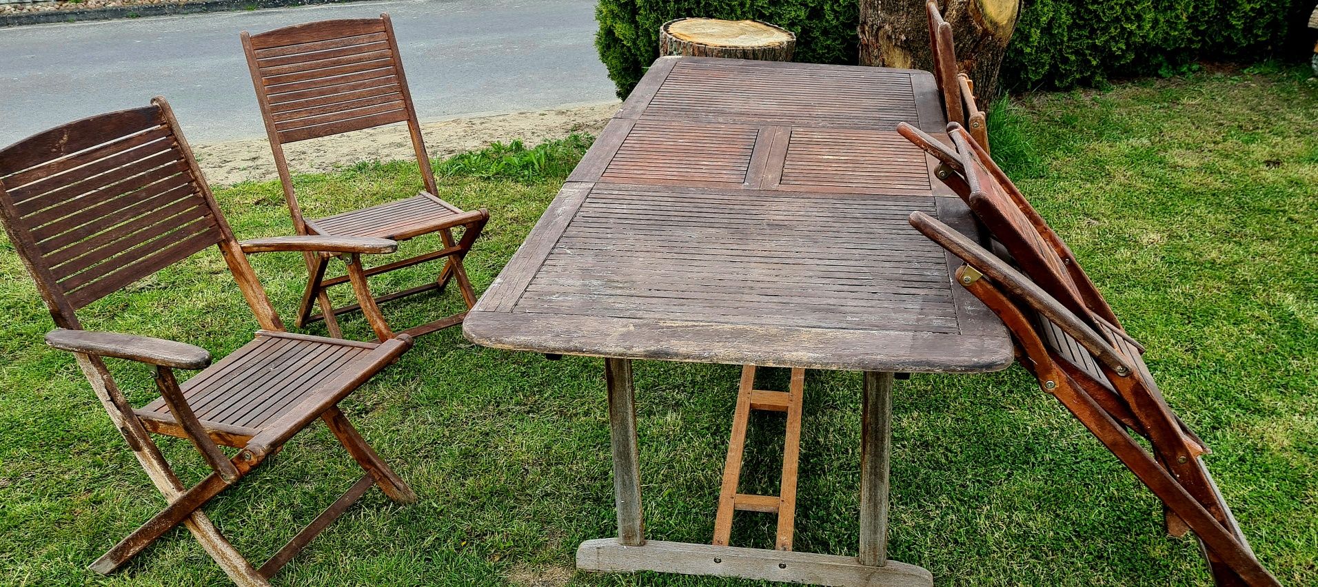 Zestaw ogrodowy drewniany stół 150do 200 cmi 4 krzesła skladane