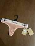 Stringi damskie rozmiar L - Calvin Klein