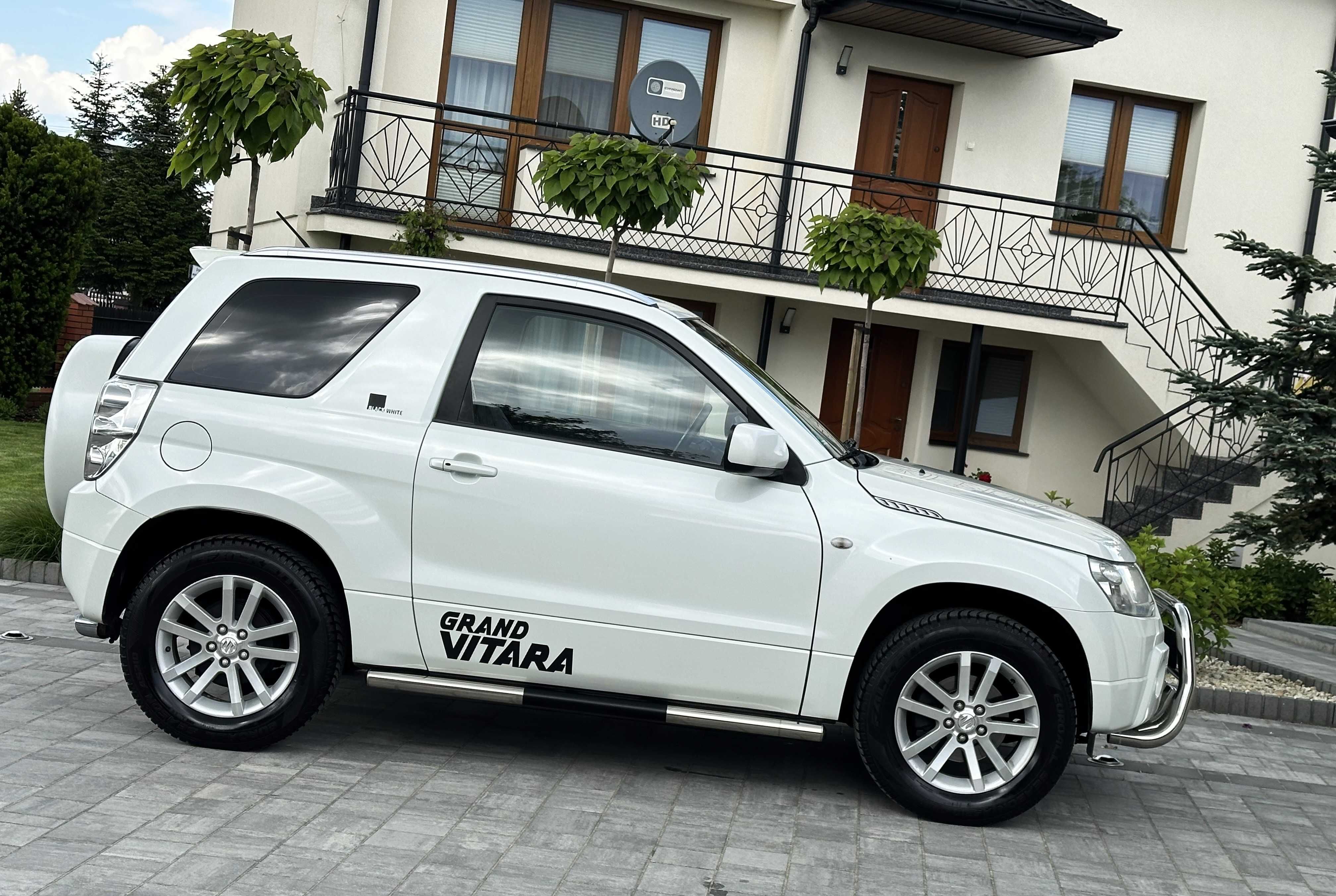 Suzuki Grand Vitara~1.6B~3d~4x4~Skóry~Navi~Kamera~GrzanyFot~BiałaPerła