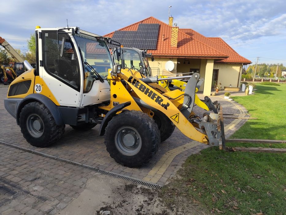 Ładowarka liebherr 508 cat jcb