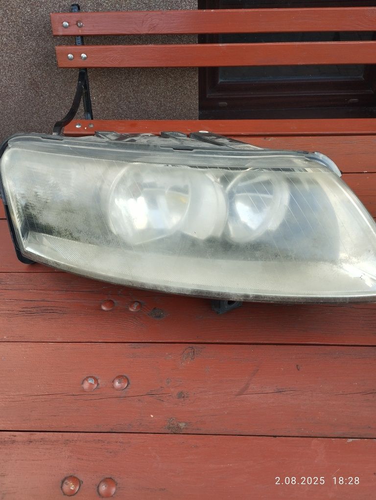 Lampy oryginalne HELLA przód Audi A6 C6