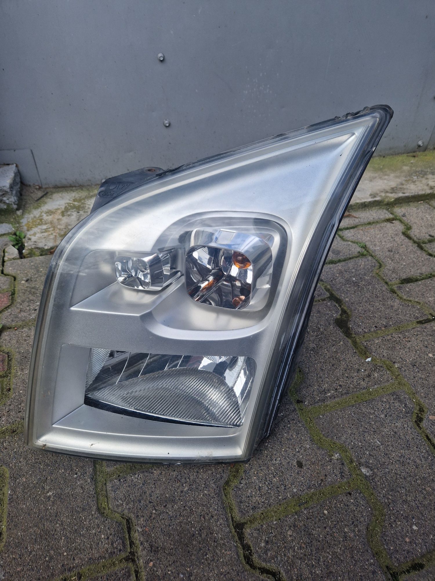 Reflektor przedni lewy lampa Ford Transit mk7 orginał wysyłka