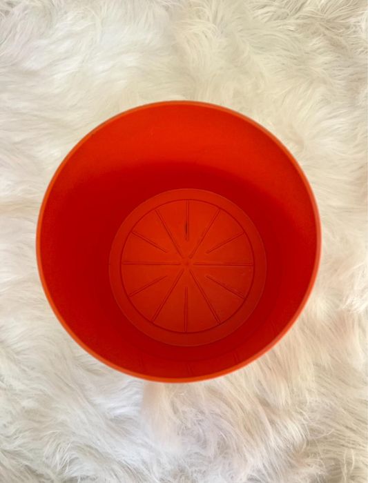 Cachepot laranja da Kartell