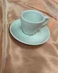 Chavenas de café com pires