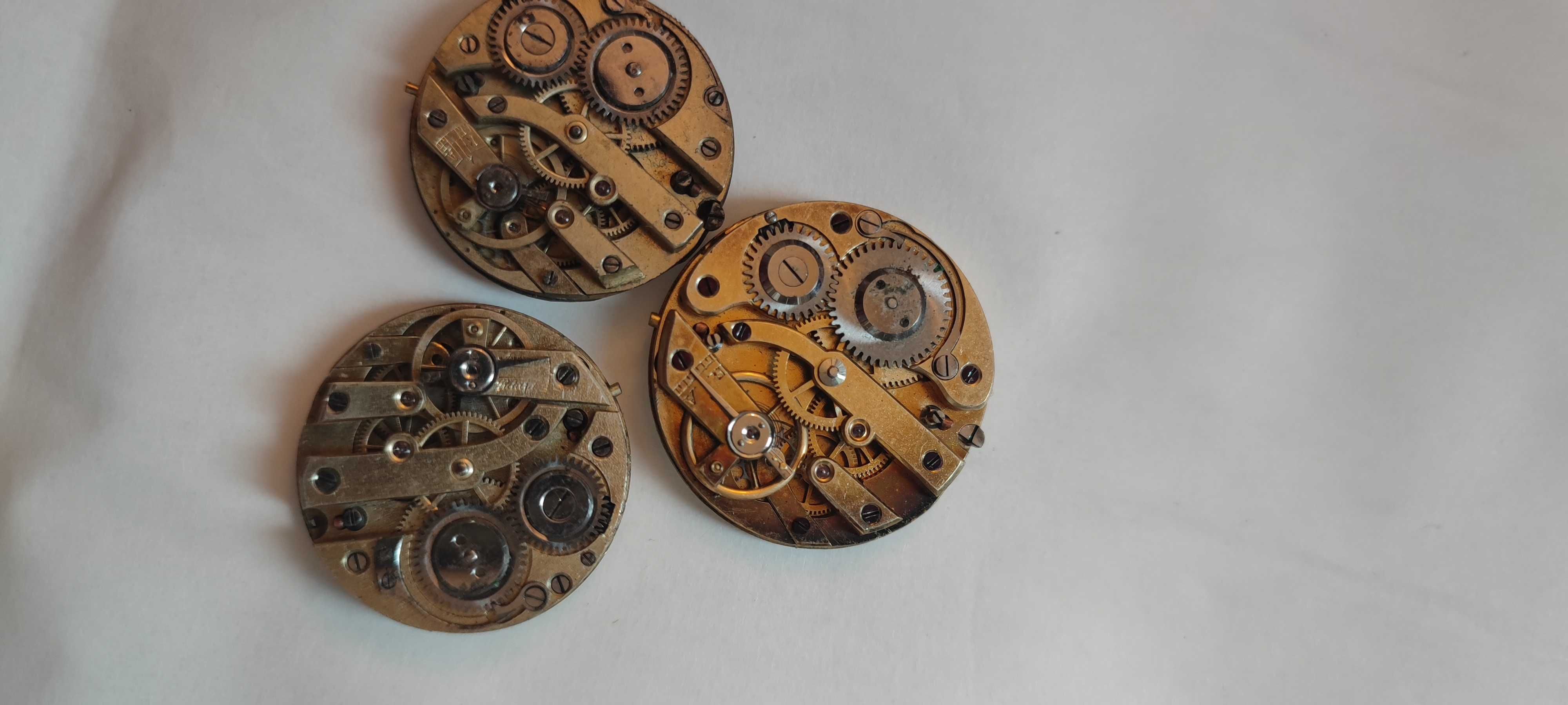trzy mechanizmy do malych kieszonek porcelanki