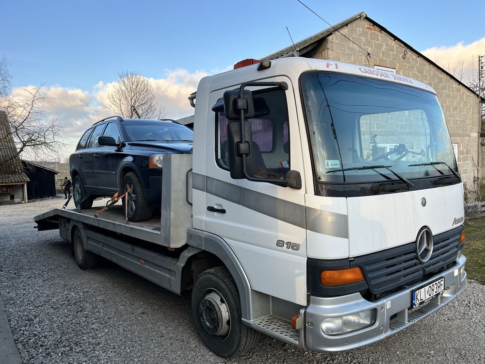 Pomoc drogowa. Autolaweta.Usługi transportowe.