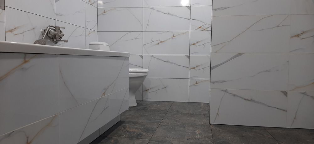 Штукатурка стін та стель, плиточні роботи, гіпсокартон.