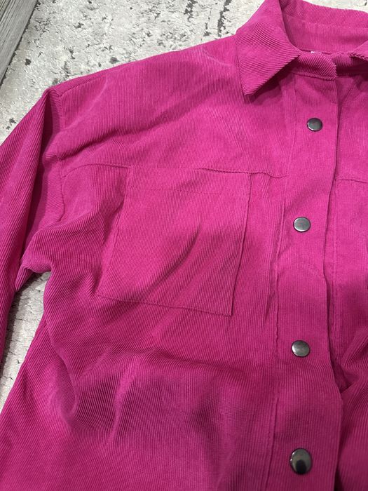 Рожевий костюм….