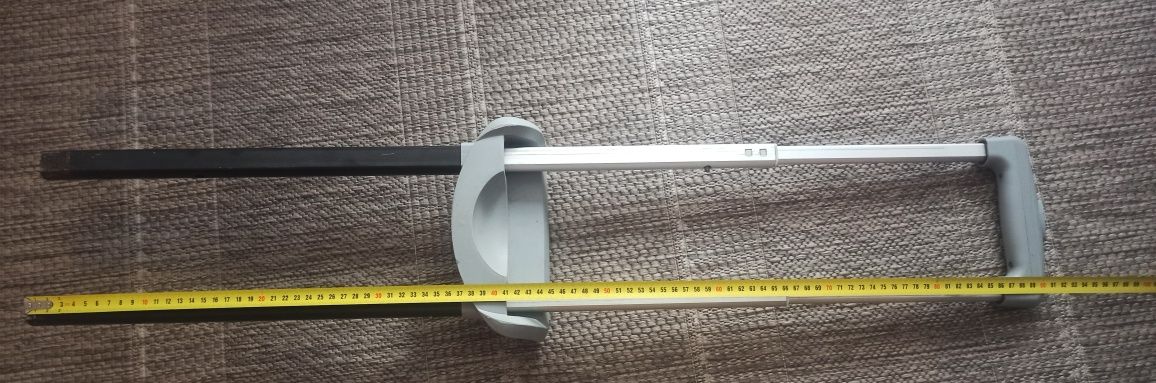 Rączka teleskopową do średniej walizki