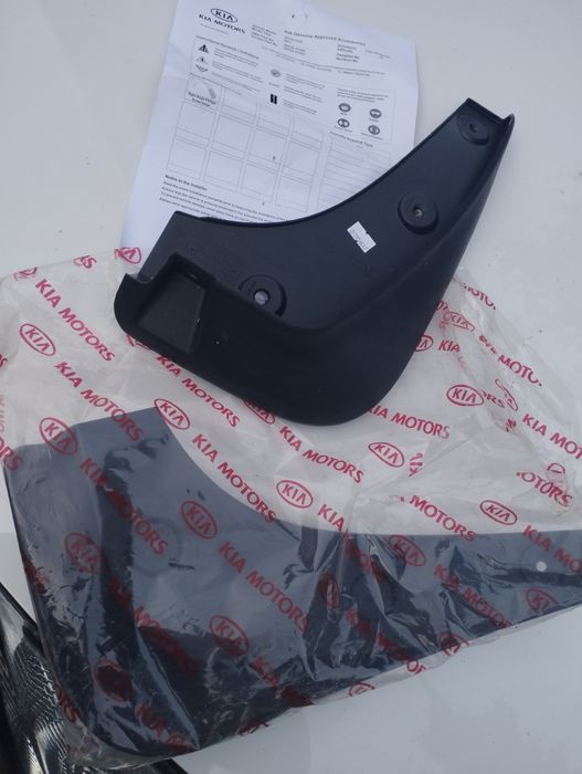 chlapacze przód  KIA SPORTAGE 2010- nowe orginał