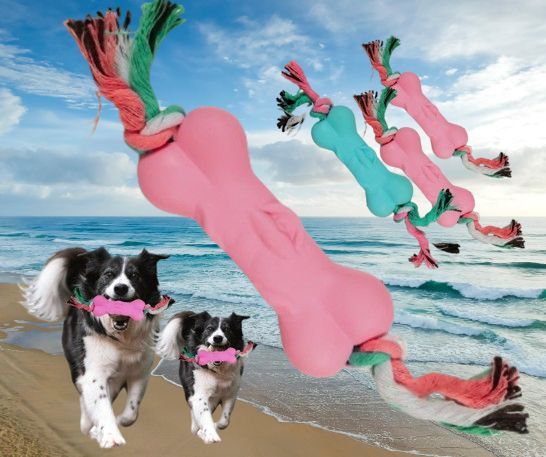 Kość dla psa ze sznurkami  gumowa zabawka aport 12 cm różowa