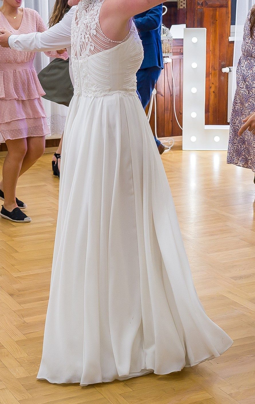 Suknia ślubna w kolorze ecreu, L