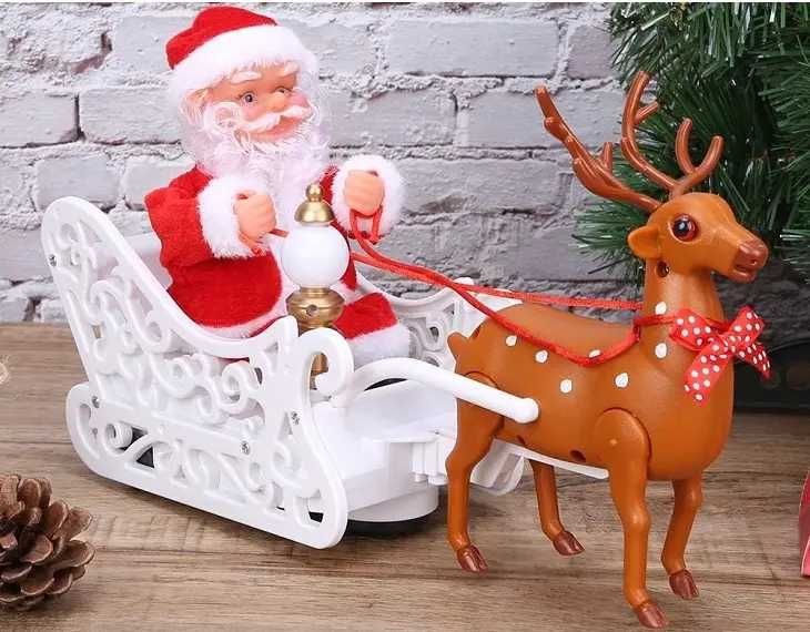 Музична іграшка «Санта Клаус із оленем на санях»