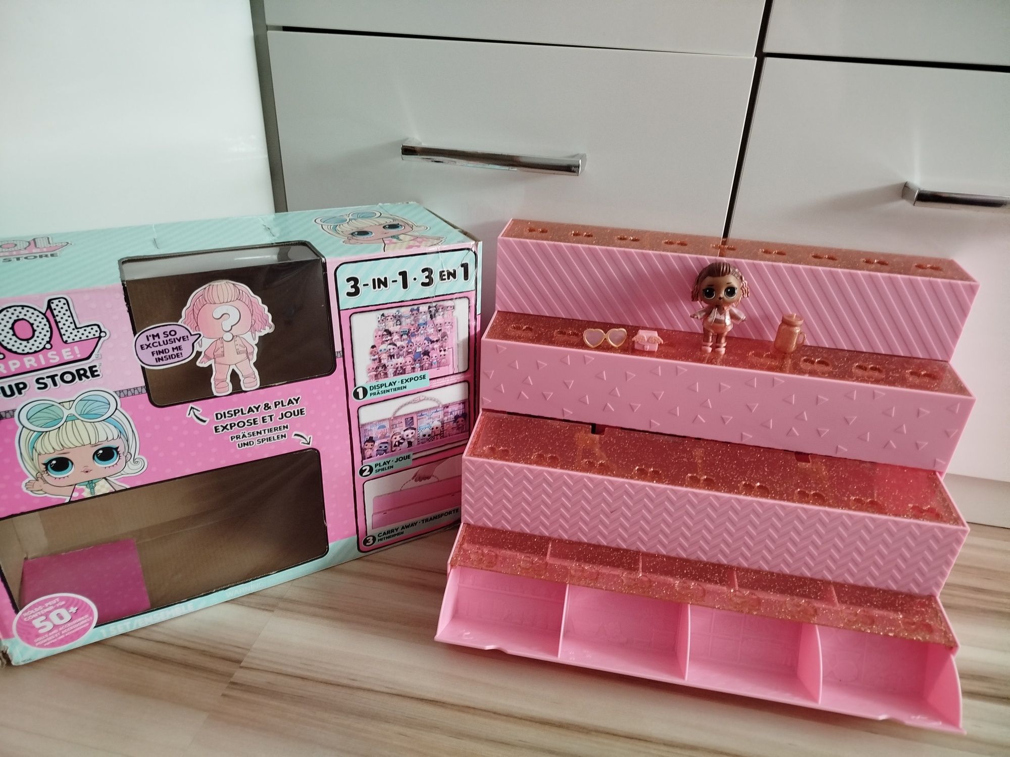 Zadbane Lol surprise domek butik półka pop up i 32 lalki