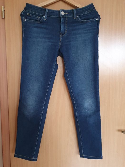 Granatowe jeansy damskie 711 skinny Levi's 26/30