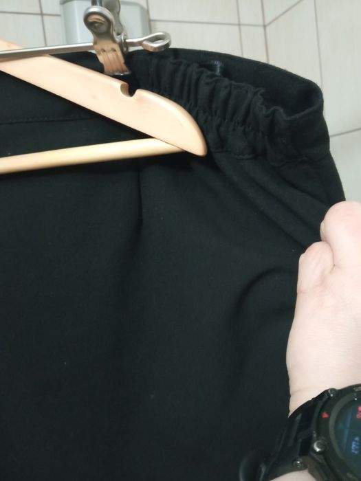Spodnie damskie plus XXXL czarne eleganckie w kant z suwakiem