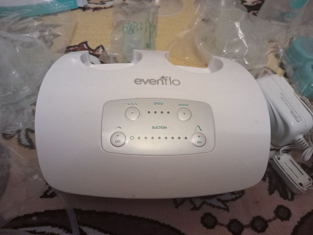 Электрический молокоотсос Evenflo