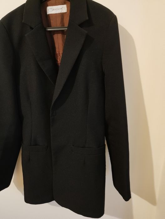 Blazer preto Origem
