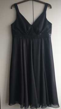 Zwiewna połyskująca czarna sukienka