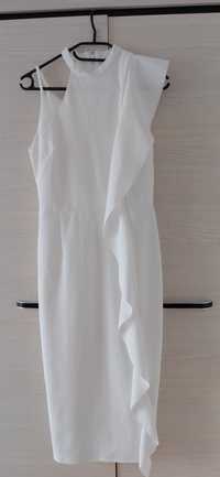 Biała sukienka z falbaną