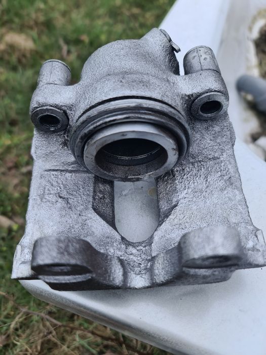 Zacisk lewy prawy zaciski komplet bmw e46 po pełnej regeneracji oryg