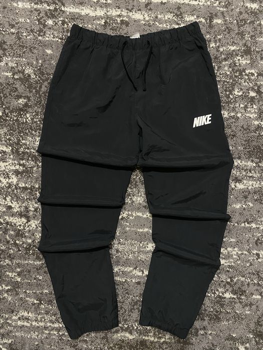 Нейлонові штани Nike чорного кольору М-Л розміру