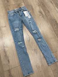 Spodnie jeansowe nowe  rurki dziury postrzępione slim jeans XS