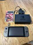 Nintendo switch v2 szary z etui + 2 gry