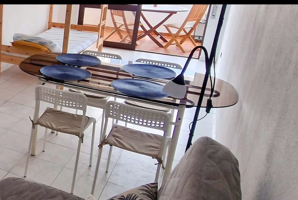 Mesa de vidro e alumínio com 4 cadeiras