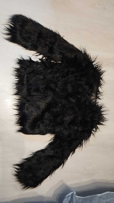 Casaco de pelo preto