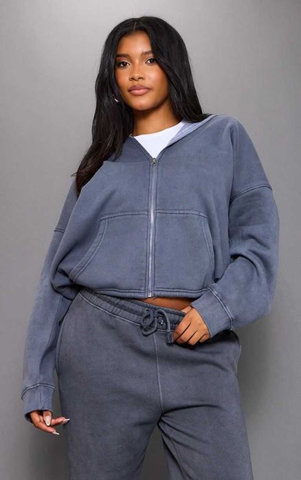 Толстовка оверсайз з потертостями з капюшоном та кишенями на флісі