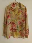 Vendo blusa em seda tamanho 46 M  ou L