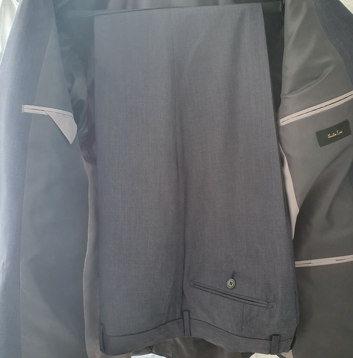 Fato azul da SuitsInc.